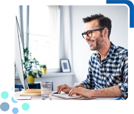 Happy Developer working at computer